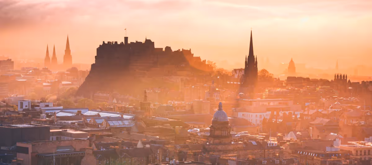 Edinburgh Castle at misty sunset